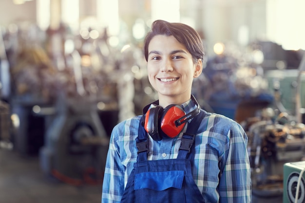 Satisfied female factory worker