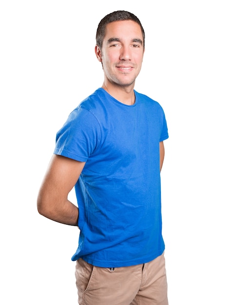 Satisfied young man against white background