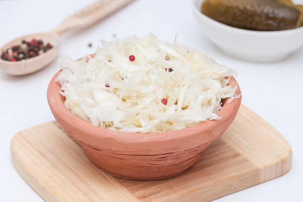 Sauerkraut in bowl. Best probiotic, healthy life concept.