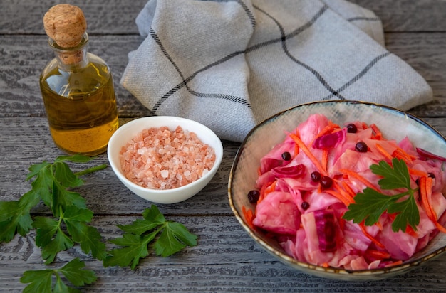 Sauerkraut in a bowl on a wooden table Healthy fermented food rich in vitamins antioxidants fiber