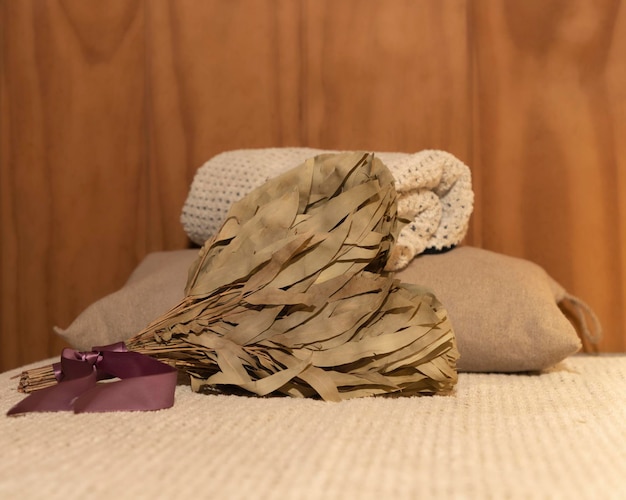 Sauna accessories for the celebration of Valentine's Day. Eucalyptus broom in the shape of a heart.