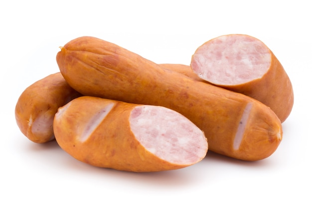 Sausage and spices isolated on white, fresh delicious frankfurter.