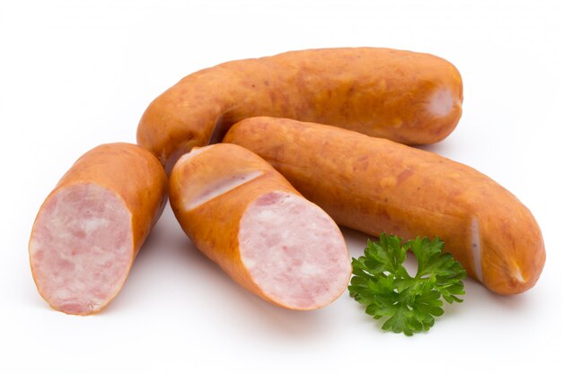 Sausage and spices isolated on white space, fresh delicious frankfurter.