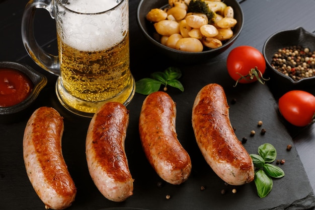 Sausages with beer Fried anchovies and delicious food with beer