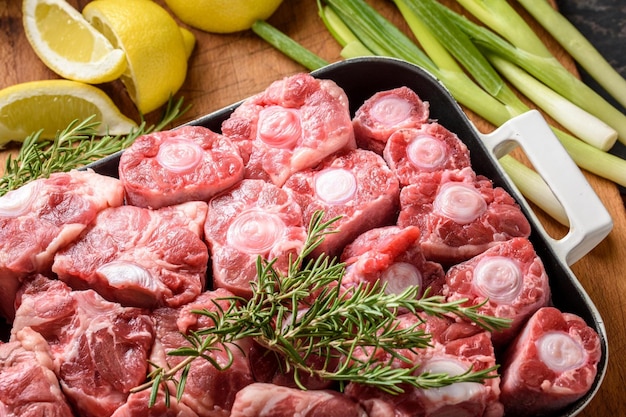 Savory Delicacy CloseUp of Raw Oxtail Pieces Seasoned with Sea Salt and Spices Showcasing in 4k