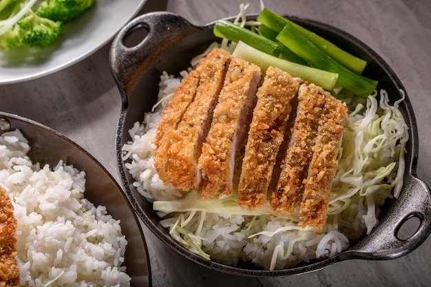 Savory Delights CloseUp of DeepFried Orange Chicken Served on a Bed of Steamed White Rice in 4k