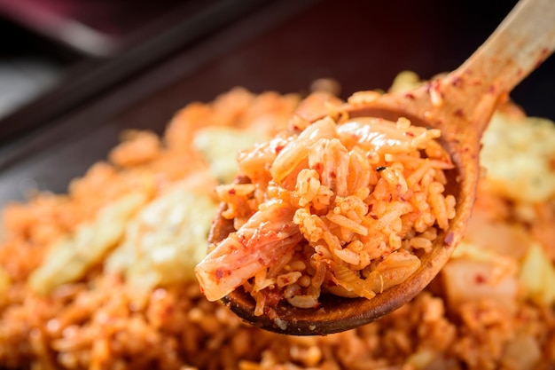 Savory Fusion CloseUp of Kimchi Fried Rice a Delectable Blend of Flavors in 4K Resolution