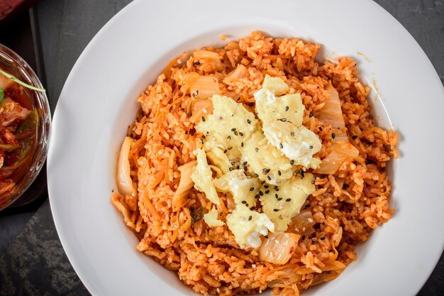 Savory Fusion CloseUp of Kimchi Fried Rice a Delectable Blend of Flavors in 4K Resolution