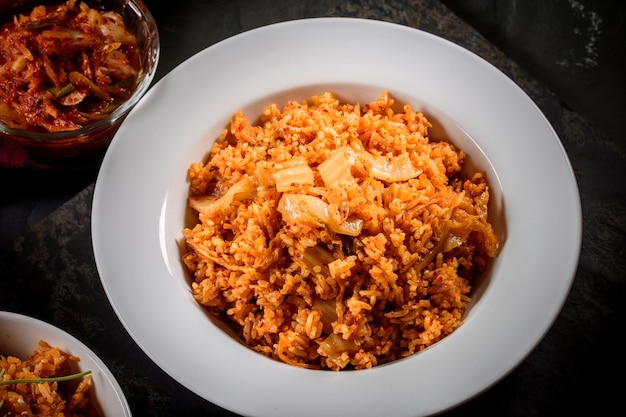 Savory Fusion CloseUp of Kimchi Fried Rice a Delectable Blend of Flavors in 4K Resolution