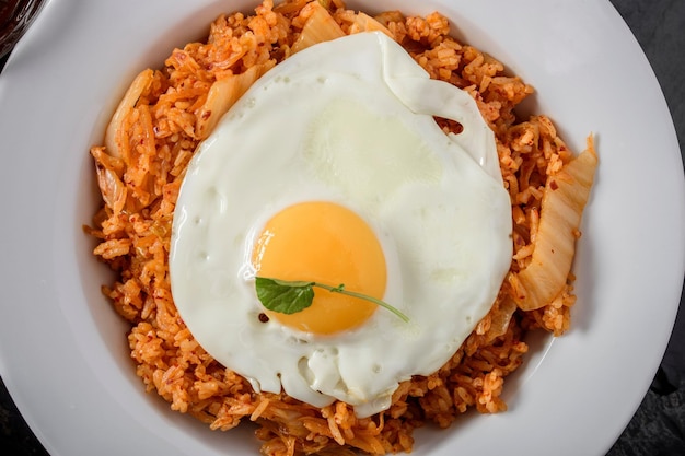 Savory Fusion CloseUp of Kimchi Fried Rice a Delectable Blend of Flavors in 4K Resolution