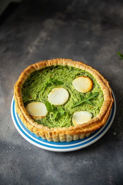 savory pie green spinach tart cheese fresh healthy meal food snack on the table copy space food