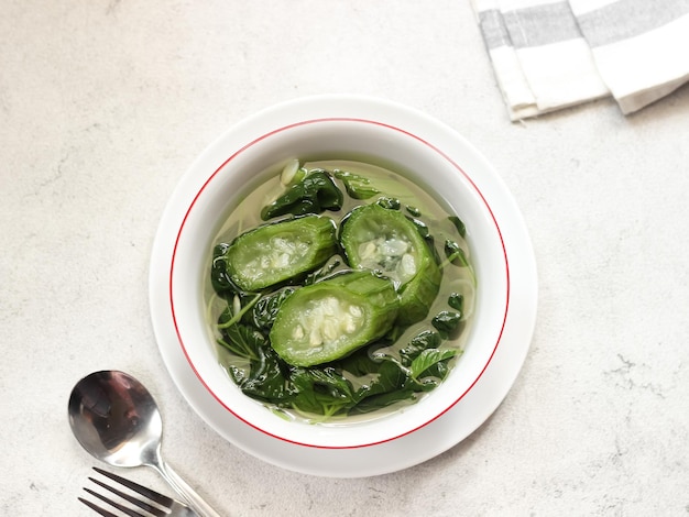 Sayur bening bayam dan gambas or clear soup of spinach and luffa vegetables