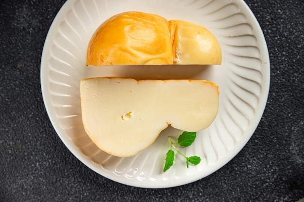 scamorza cheese smoked flavor healthy meal food snack on the table copy space food background