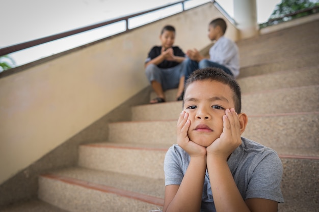 scared and alone, young Asian child