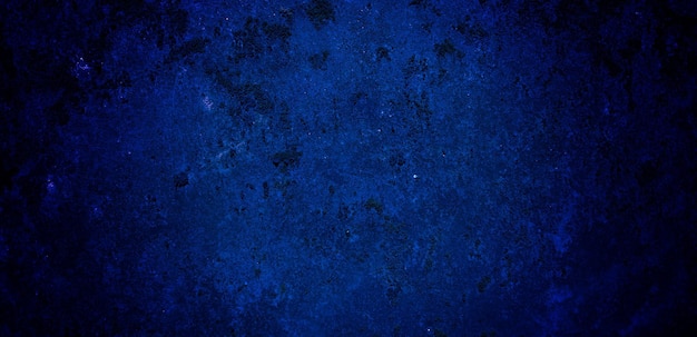 Scary dark blue grunge texture for background dark blue wall horror concept