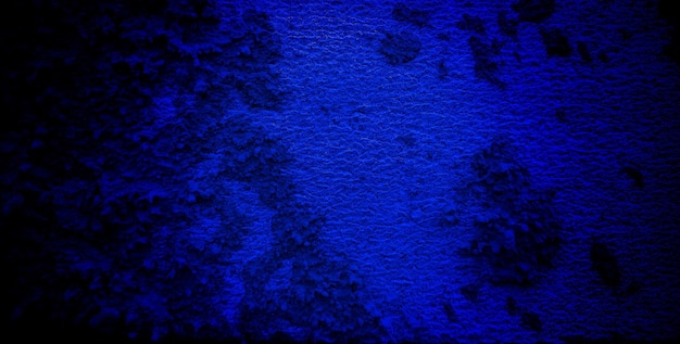 Scary dark blue grunge texture for background dark blue wall horror concept