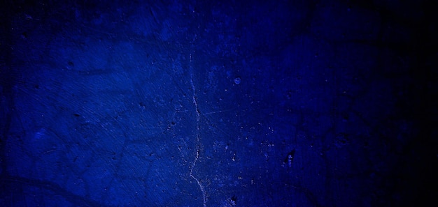 Scary dark blue grunge texture for background dark blue wall horror concept