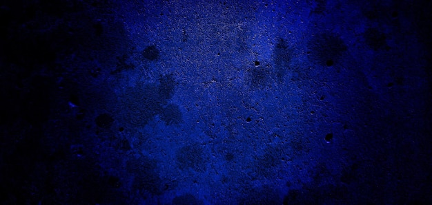 Scary dark blue grunge texture for background dark blue wall horror concept