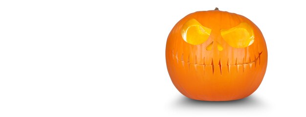 Scary Halloween pumpkin with eyes glowing inside on white background