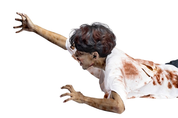 Photo a scary zombie with blood and wounds on his body crawling isolated over a white background