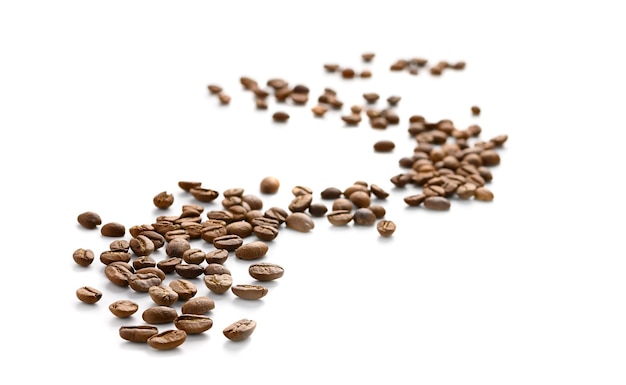 Scattered Coffee beans isolated on white background