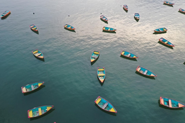 Scattered distributed of small boat in the calm sea