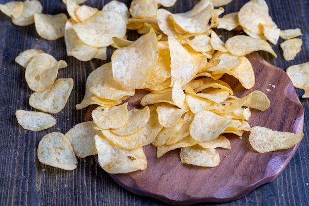 Scattered potato chips with natural spices