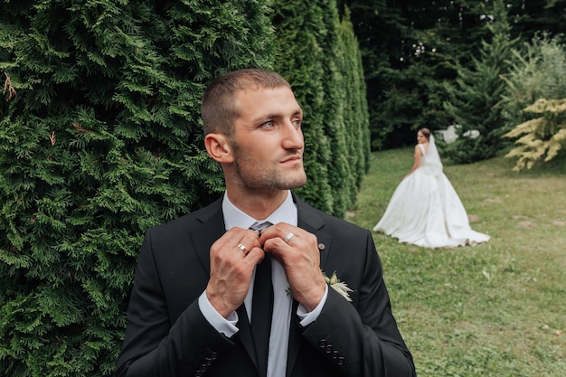 Photo the scene is set in a lush green field with trees in the background