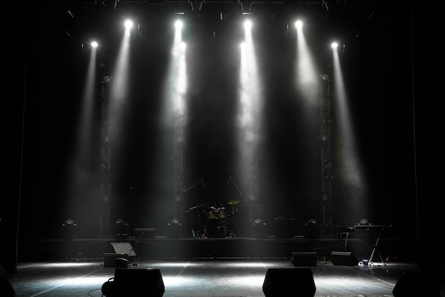 Scene, stage light with colored spotlights and smoke