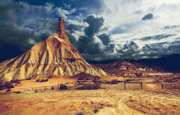 Scenery natural park.Hill and storm clouds.Dramatic desert landscape and sand mountains.