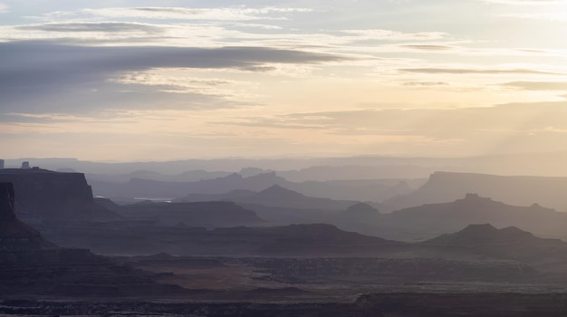 Scenic american landscape and red rock mountains in desert canyon