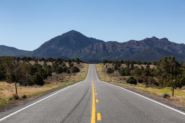 Scenic highway route in the desert with american mountain landscape