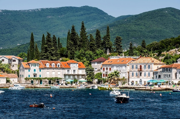 Scenic mediterranean city in montenegro with mountains view from adriatic sea beautiful architecture...