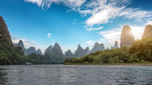 Scenic River Cruise Through Majestic Karst Mountains