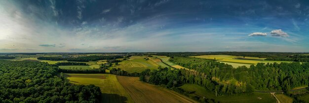 Photo scenic view of agricultural field against sky