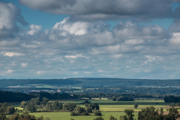 Photo scenic view of agricultural field against sky