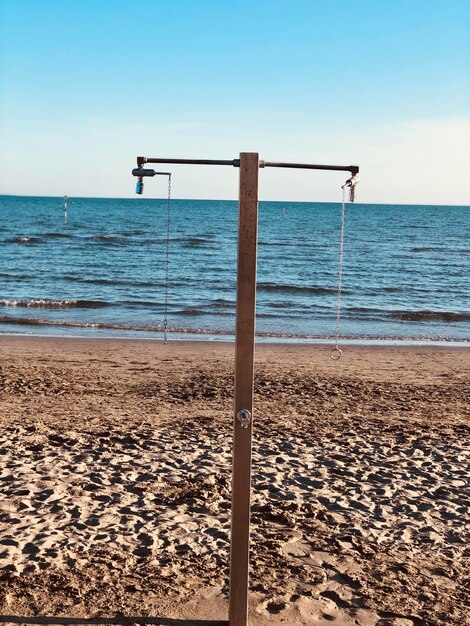 Scenic view of beach against clear sky