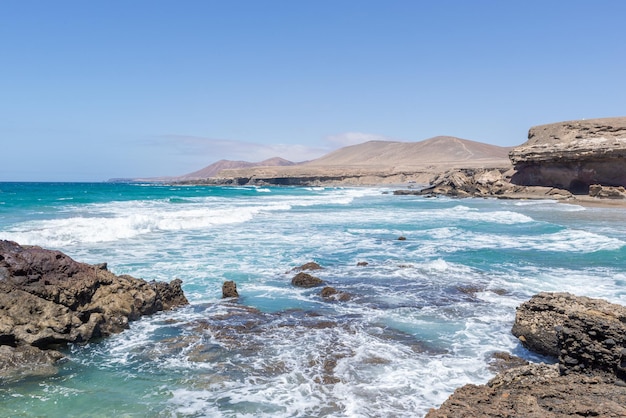 Scenic View of Beach and Mountains on Summer Time Playa de GarceyFuerteventuraCanarySpain