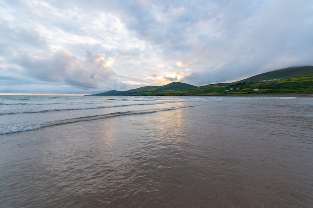 Scenic view of beautiful sunset above the sea. Tidal vawe.