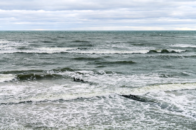 Scenic view of blue sea with foaming waves