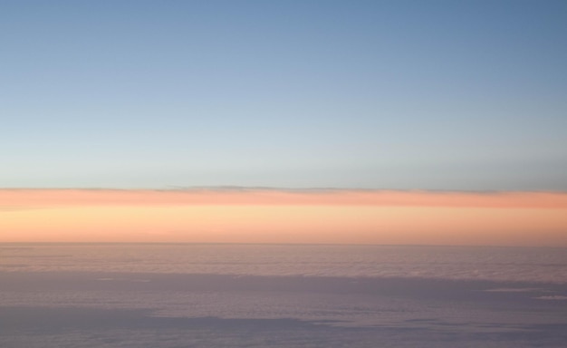 Photo scenic view of desert against sky during sunset