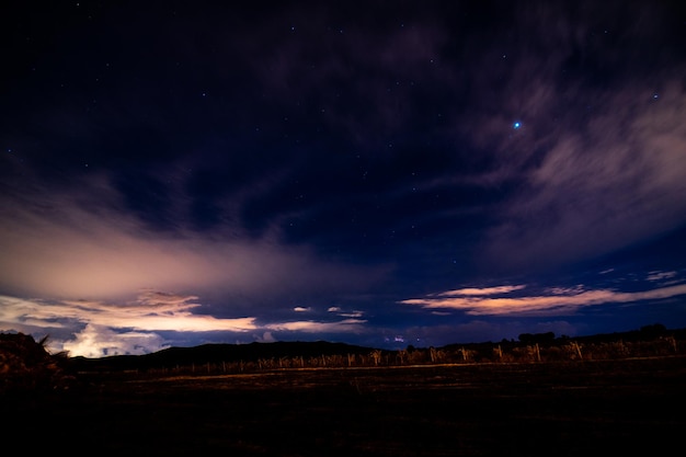 Photo scenic view of the dramatic sky over land