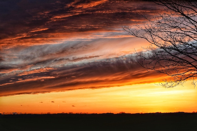 Scenic view of dramatic sky during sunset