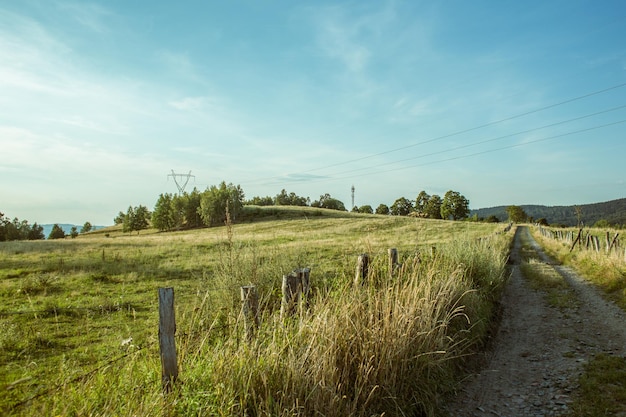 Photo scenic view of field against sky