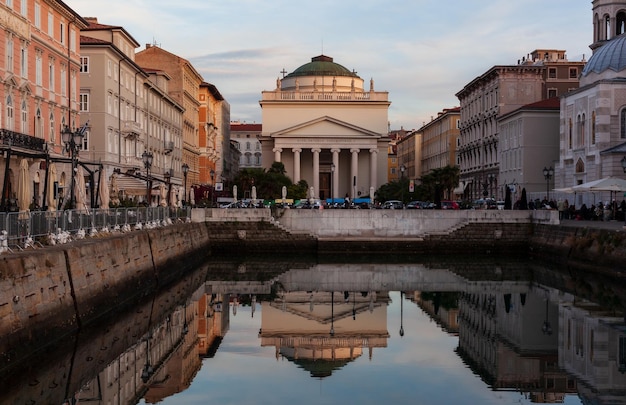 Scenic view of the Gran Canale in Trieste at sunset The Church of St Antonio Thaumaturgo