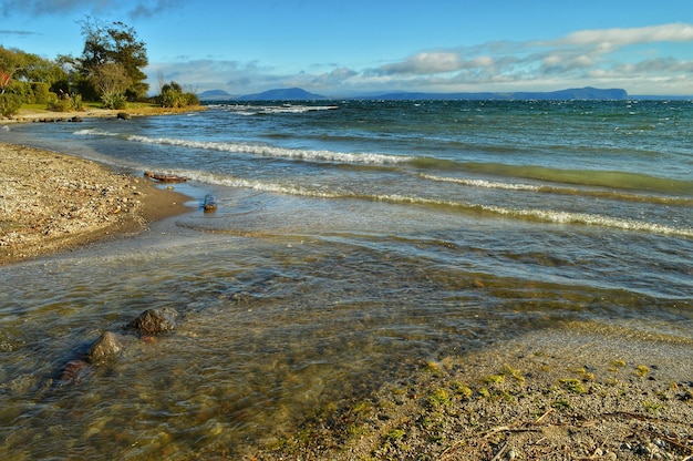 Scenic view of lake taupo against sky