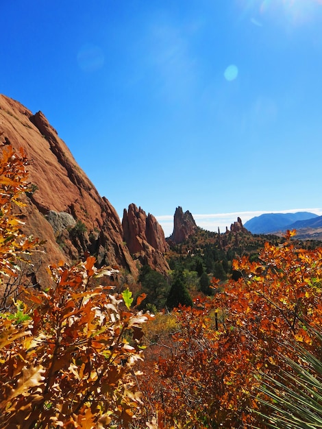 Photo scenic view of mountain against blue sky