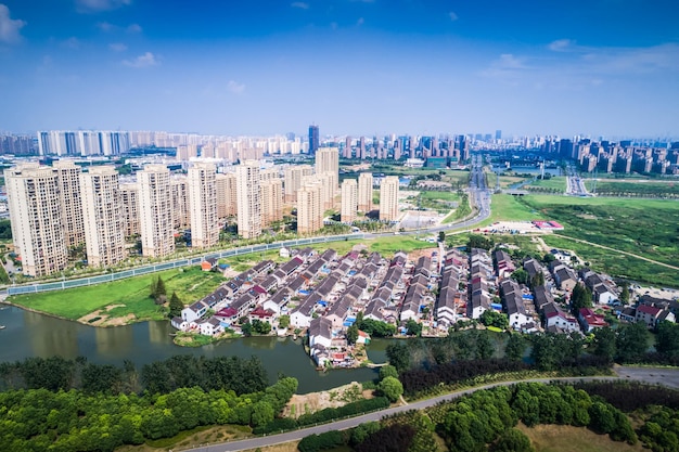 Scenic view of the park in the center of the big city in the summer With a lagoon in the middle and green trees In the atmosphere of evening light