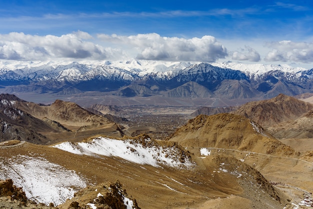 Scenic view between path on Khardung La, mountain pass in the Ladakh region of Jammu and Kashmir