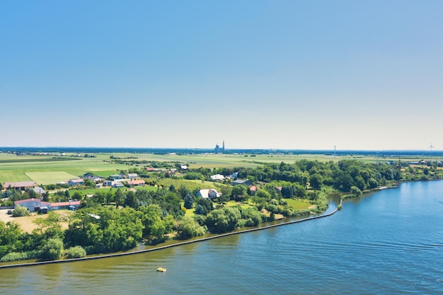 Photo scenic view of river against clear blue sky